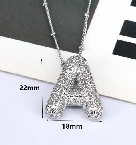 Zircon Bubble Letter Pendant.