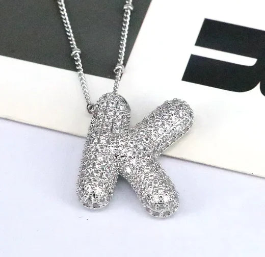 Zircon Bubble Letter Pendant.