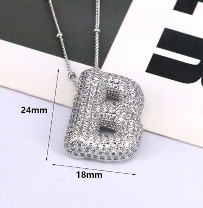 Zircon Bubble Letter Pendant.