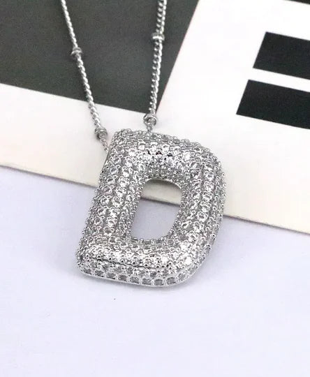 Zircon Bubble Letter Pendant.