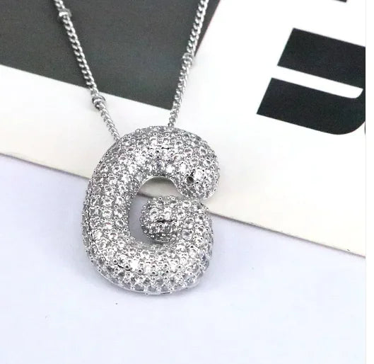 Zircon Bubble Letter Pendant.