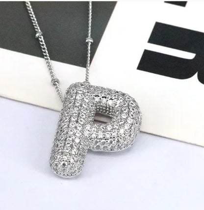 Zircon Bubble Letter Pendant.