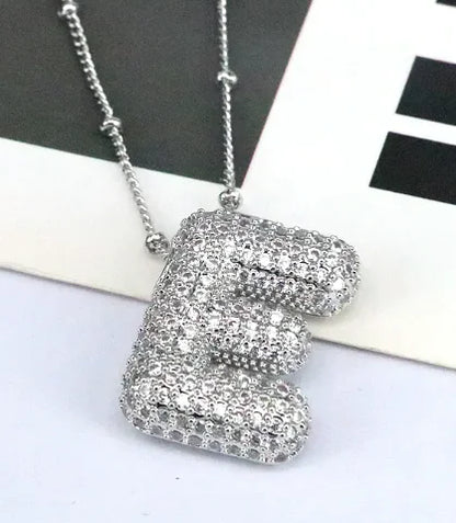 Zircon Bubble Letter Pendant.