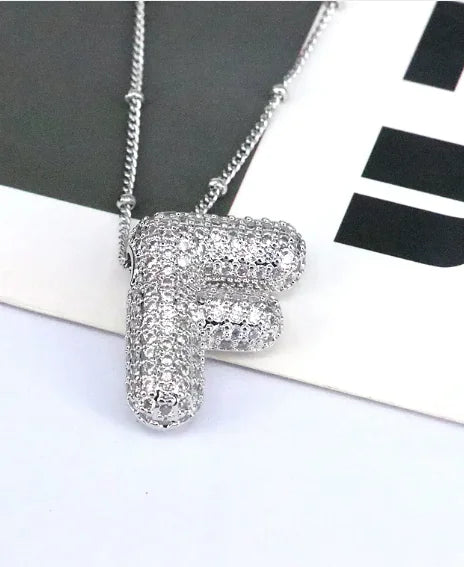 Zircon Bubble Letter Pendant.