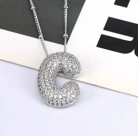 Zircon Bubble Letter Pendant.