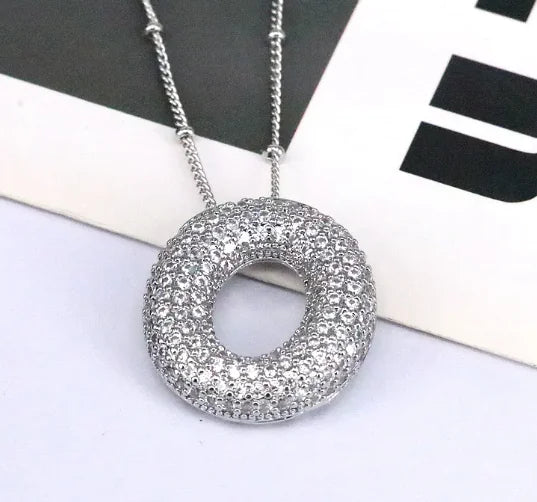 Zircon Bubble Letter Pendant.