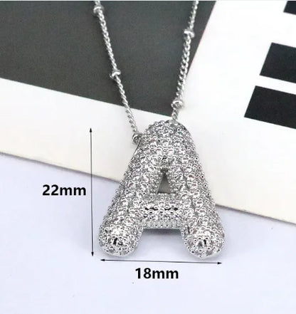 Zircon Bubble Letter Pendant.