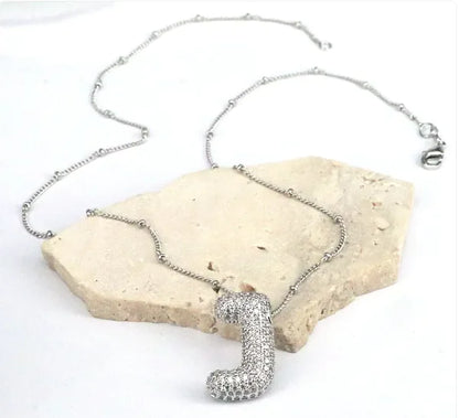Zircon Bubble Letter Pendant.