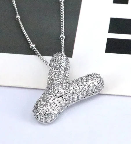 Zircon Bubble Letter Pendant.