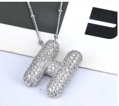 Zircon Bubble Letter Pendant.