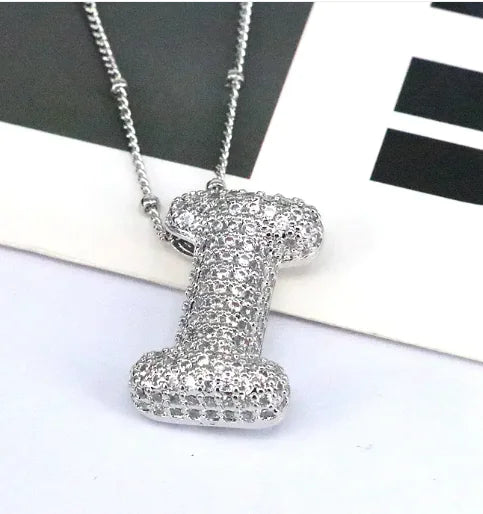 Zircon Bubble Letter Pendant.