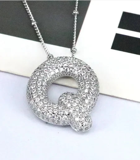 Zircon Bubble Letter Pendant.