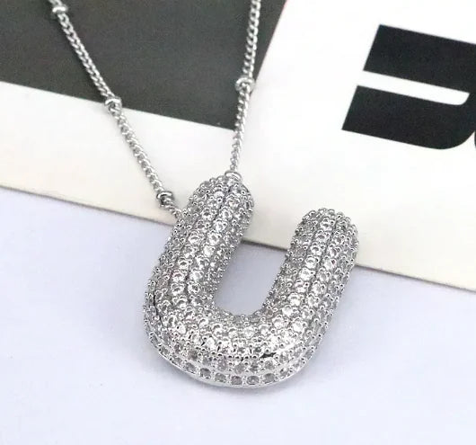 Zircon Bubble Letter Pendant.